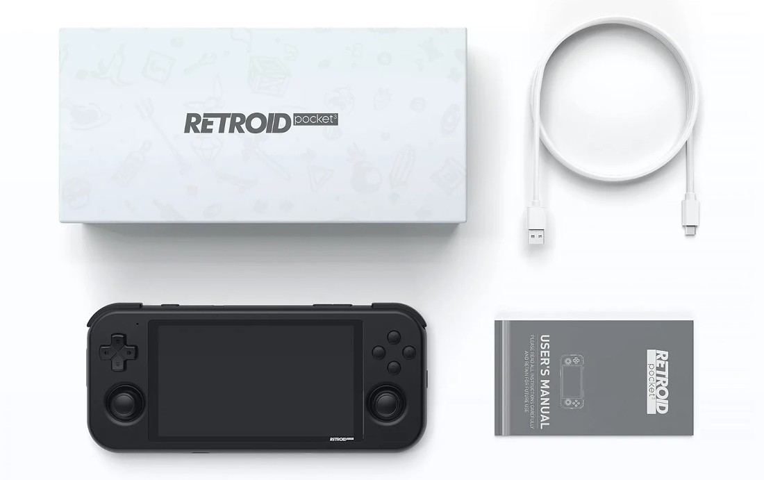 the contents of the box include an instruction manual, the Retroid Pocket 3 device, and a USB-C cable 